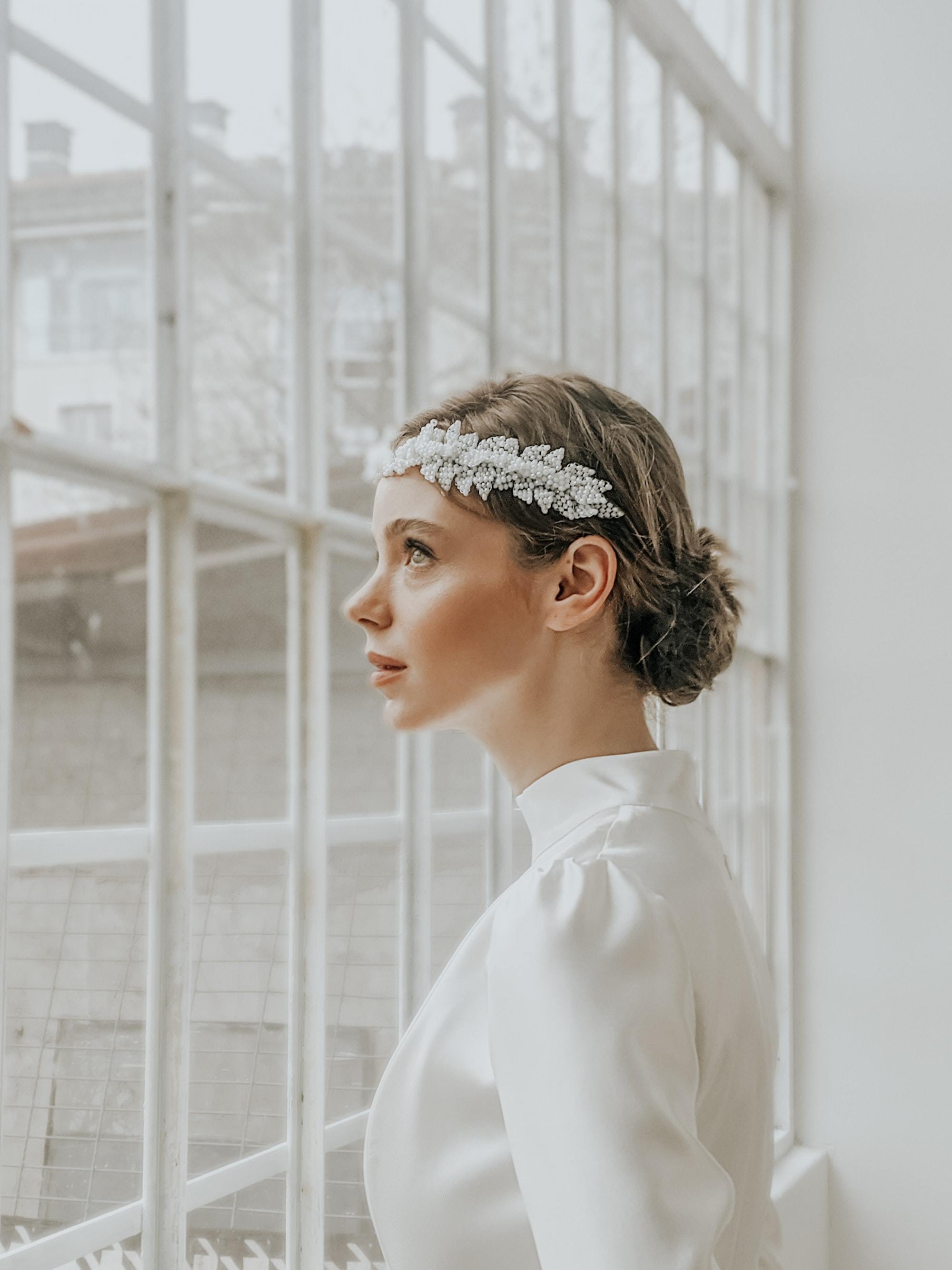 Sleek bun hairstyle with hair accessory