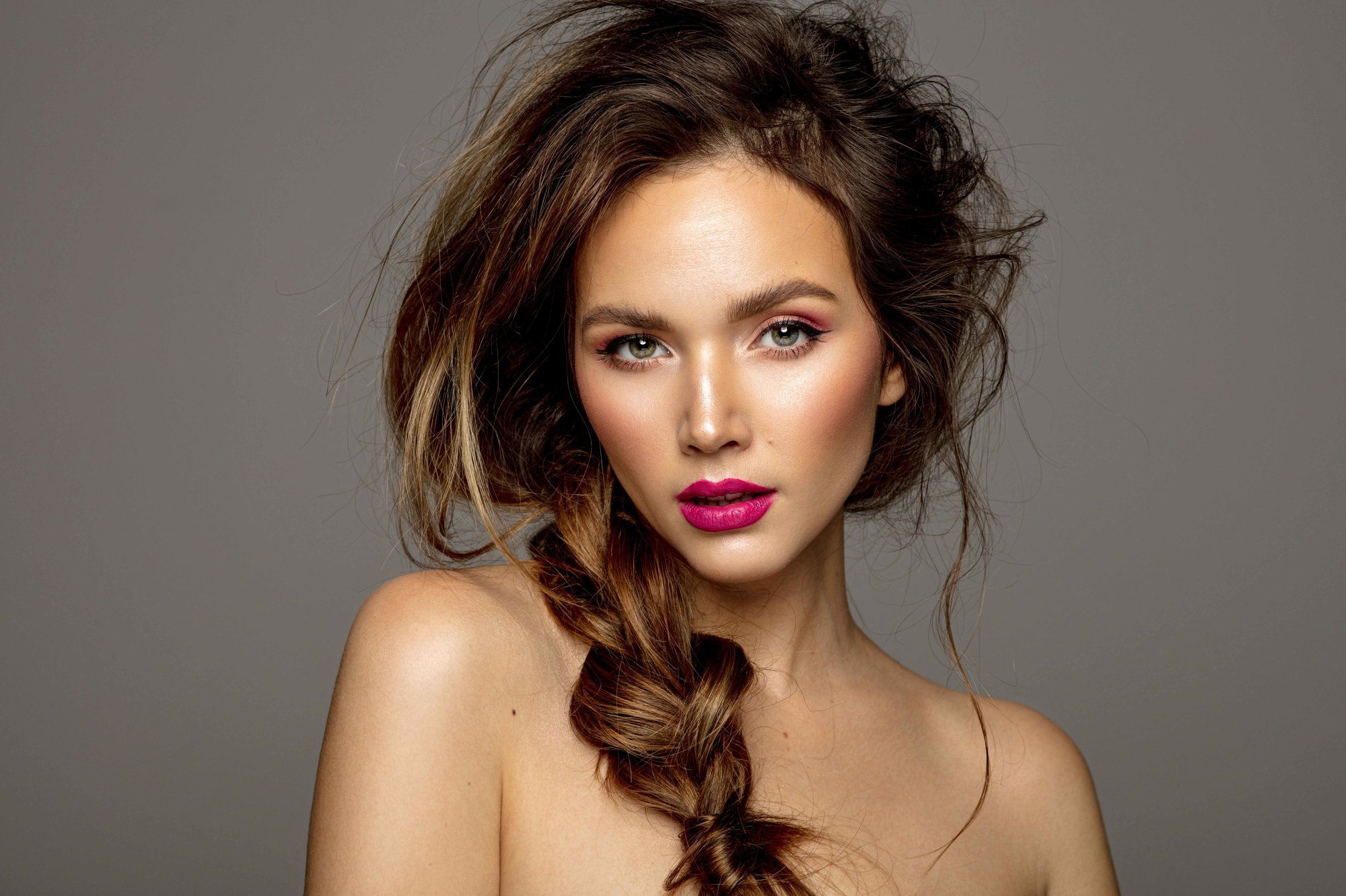 woman with a loose braided hairstyle