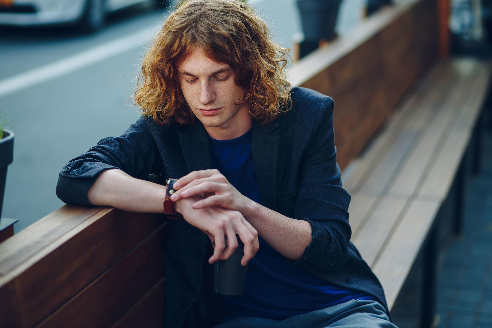 boy with long wavy hair