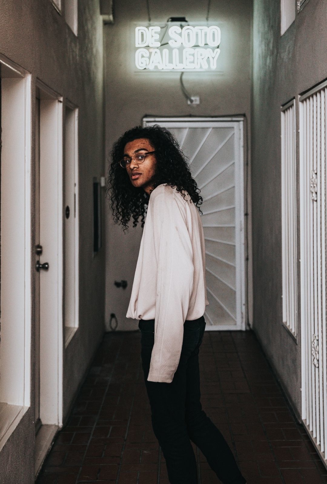 Man with very long curly hair