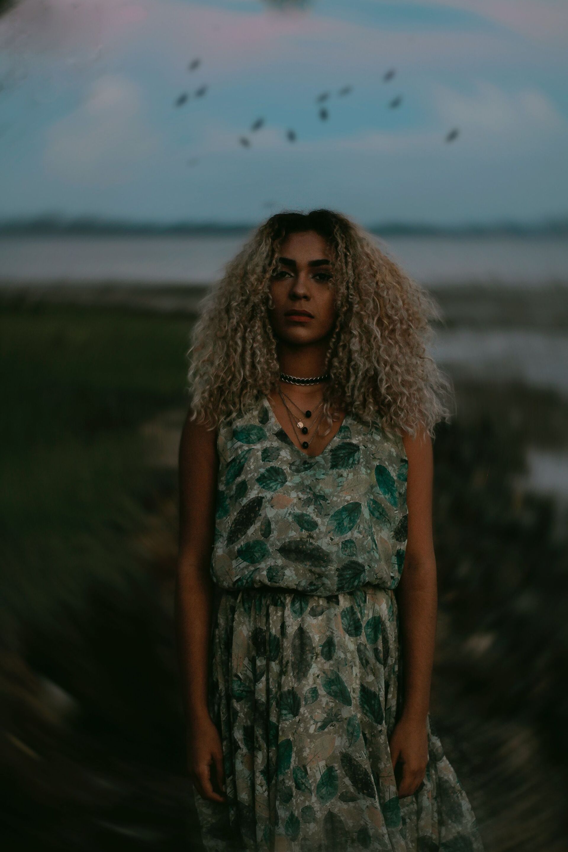 touch-up your roots: woman with long curly blonde hair