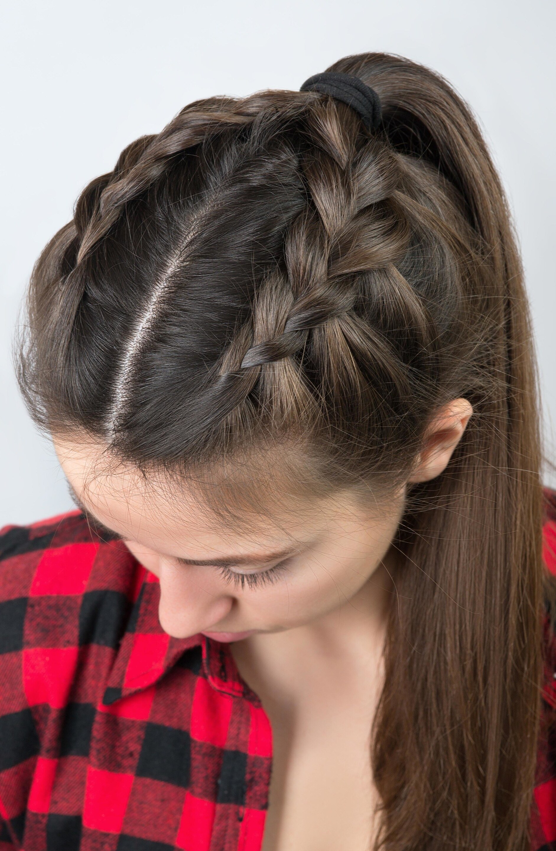 load shedding hairstyles: woman with a braid hairstyle