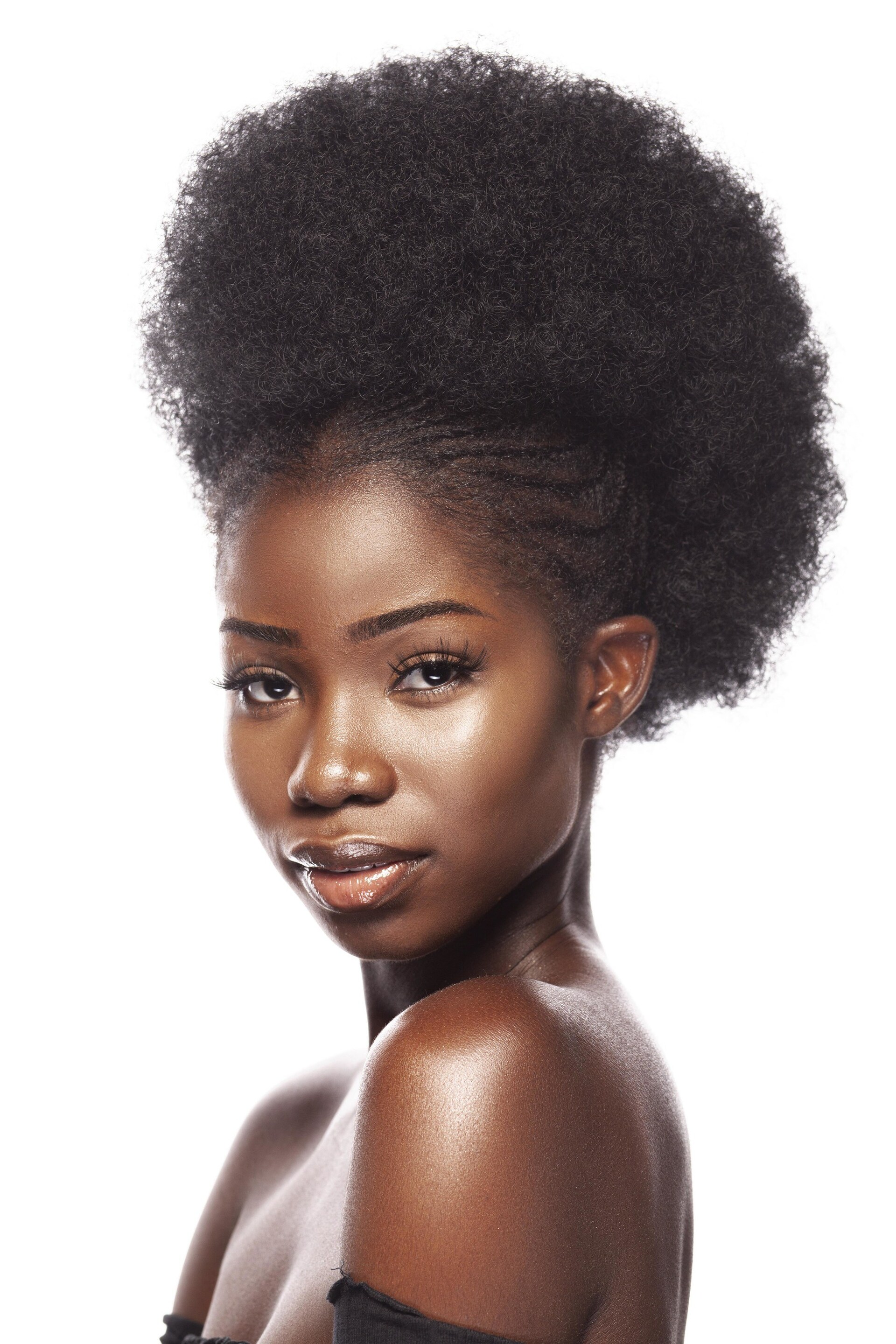woman with cornrows and afro