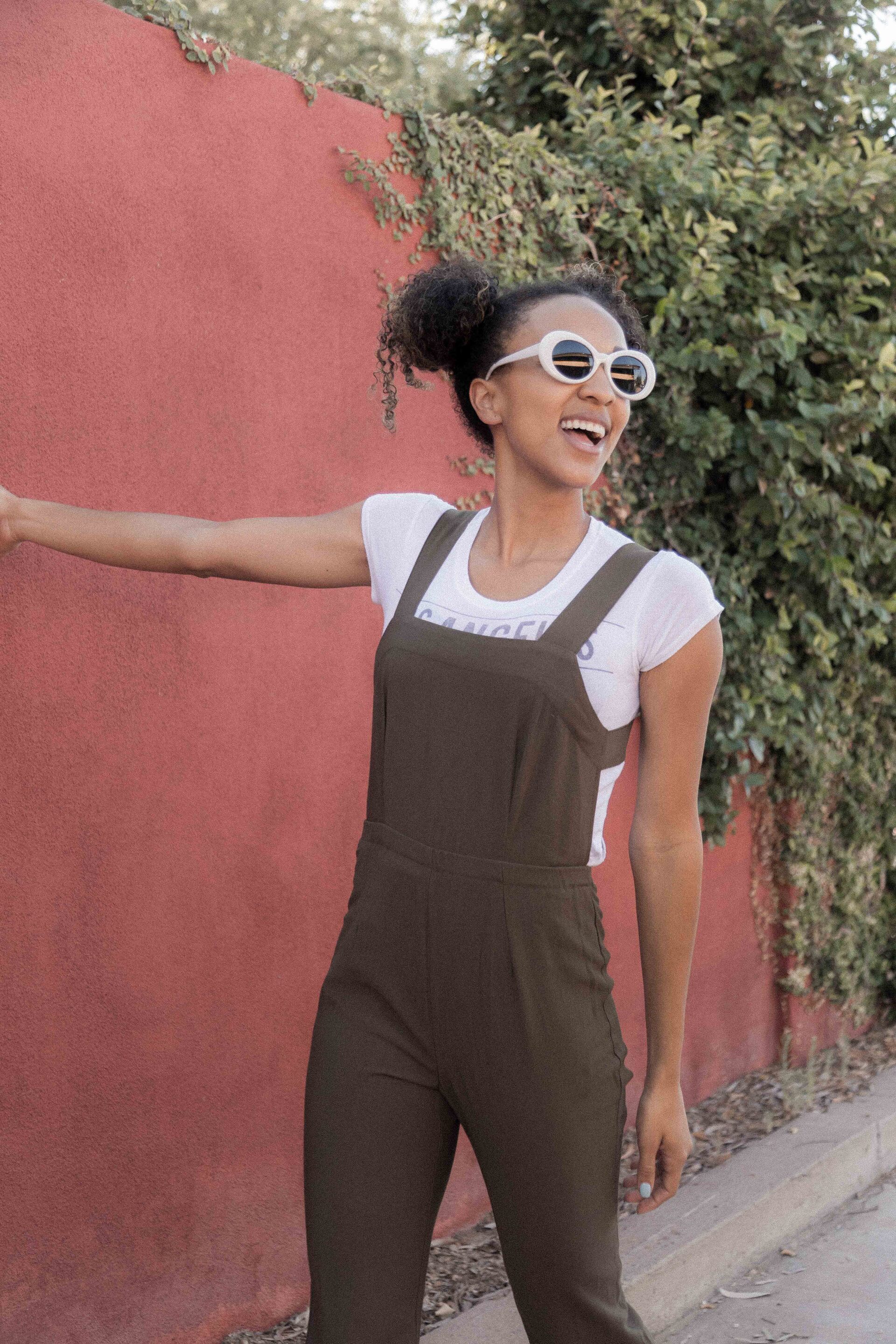 woman with a natural hair space buns hairstyle