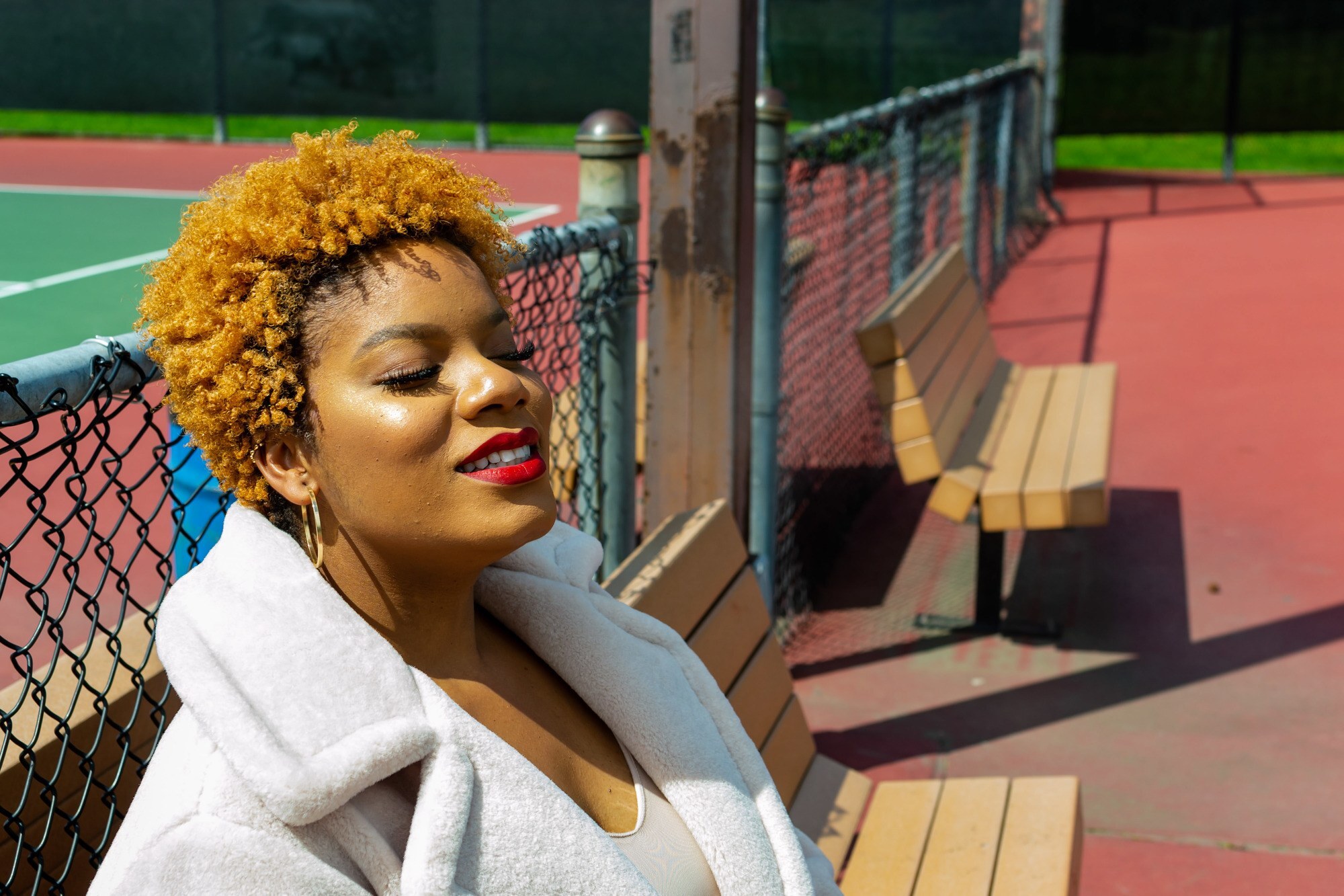 woman with ginger afro hair