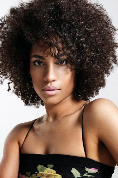 deep condition your hair: woman with full afro hairstyle