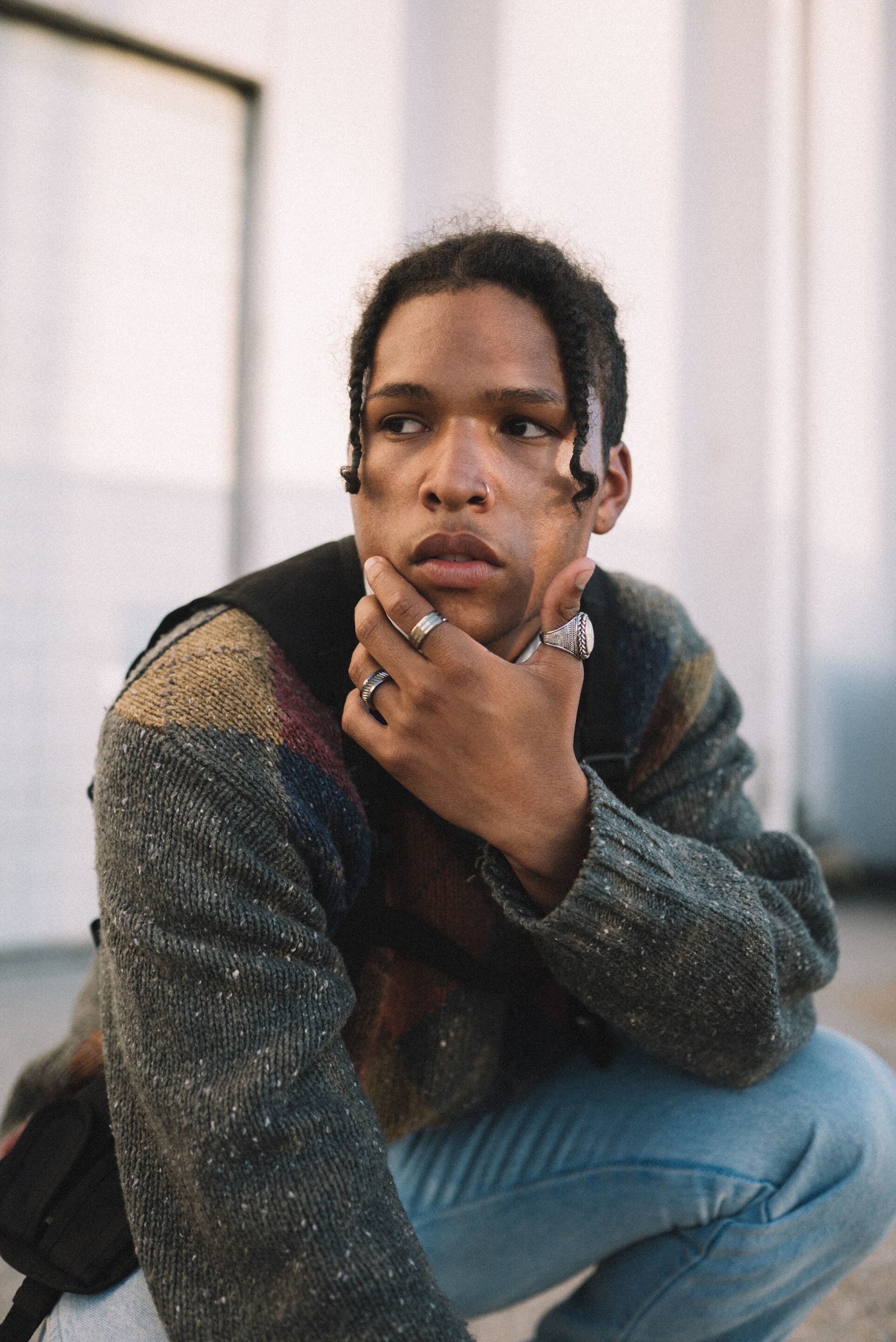 man with a braided hairstyle