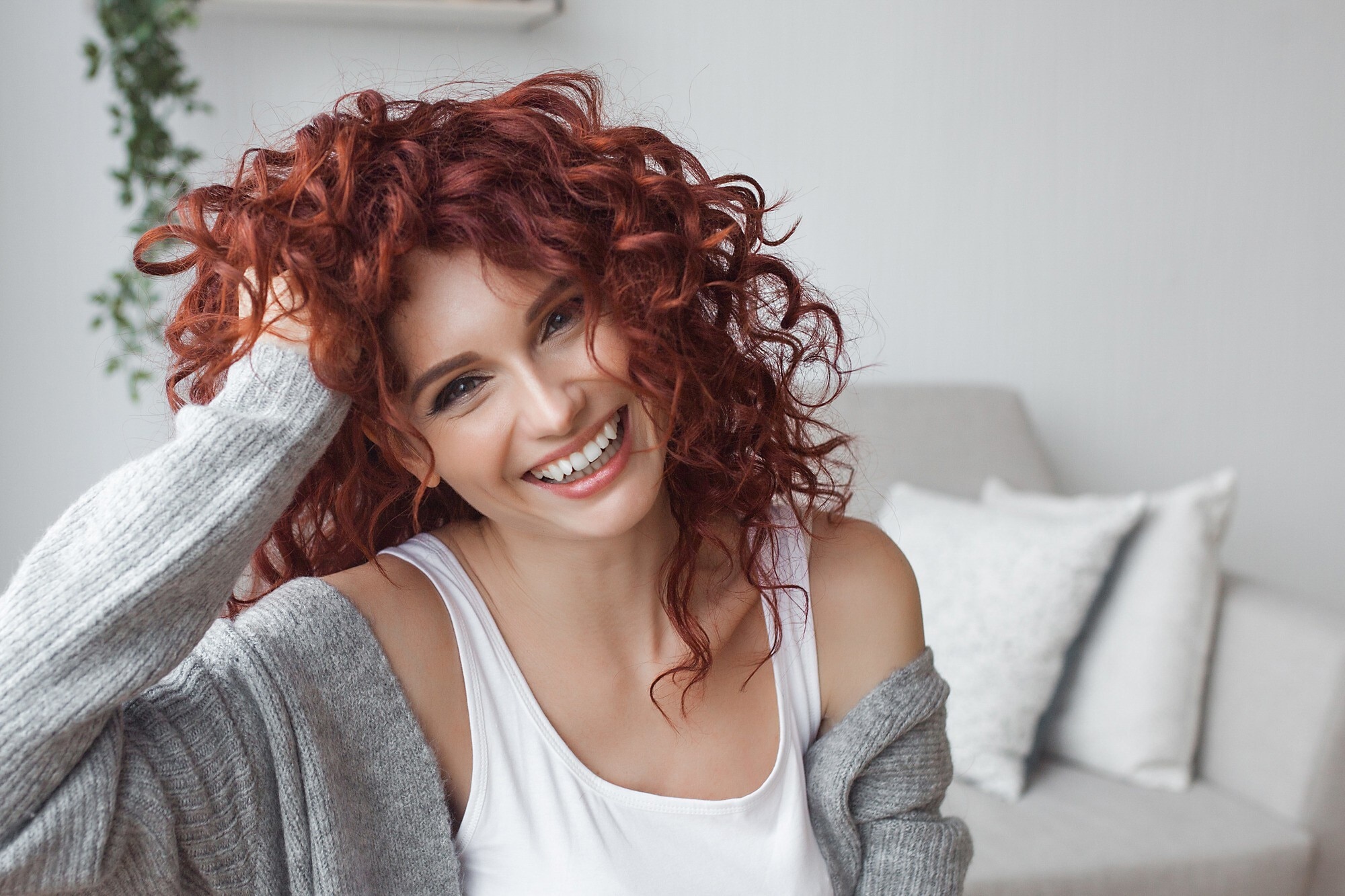 curl medium length hair: woman shoulder length, red curly hair