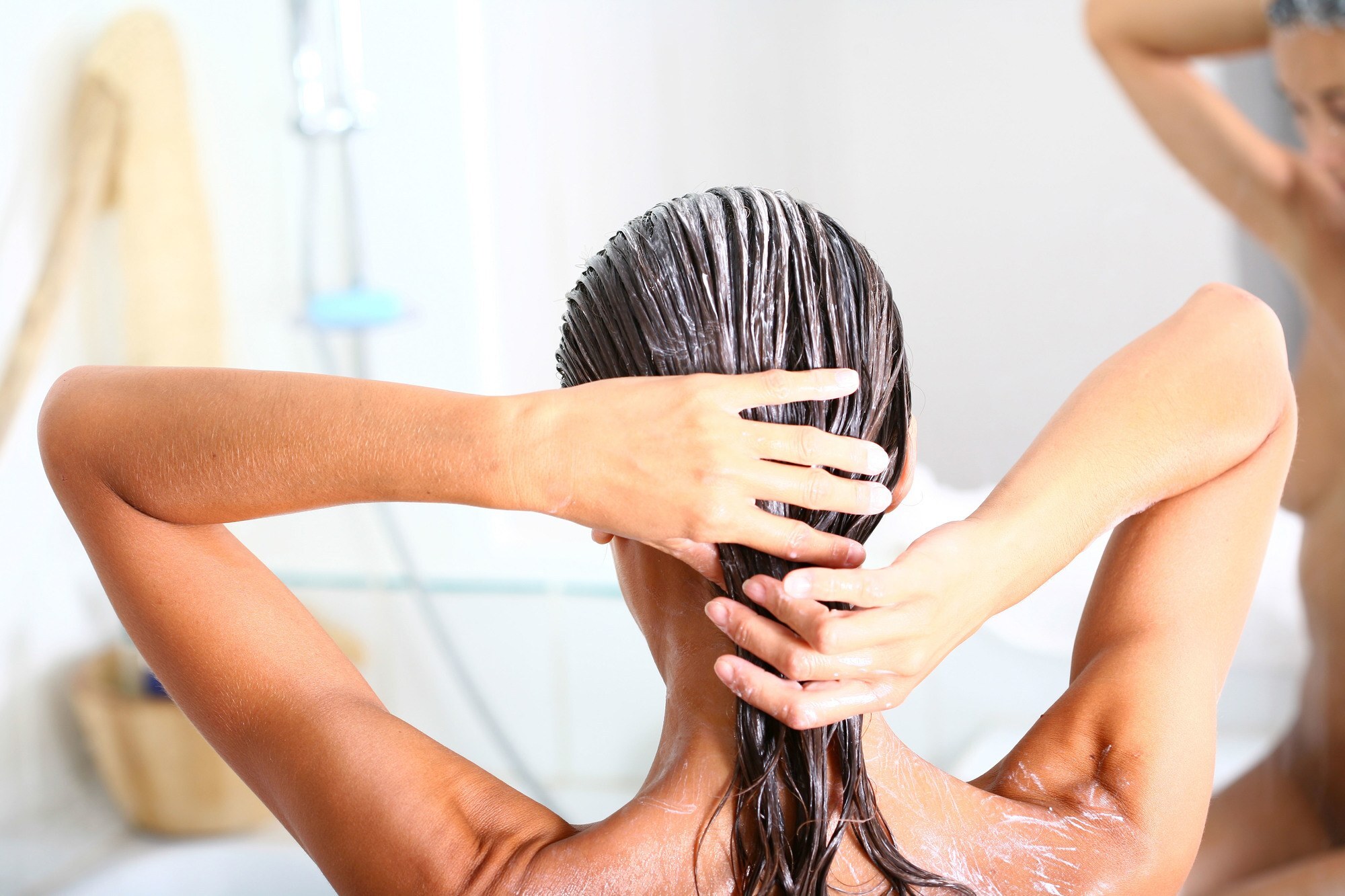 self-isolation: woman with product in wet hair