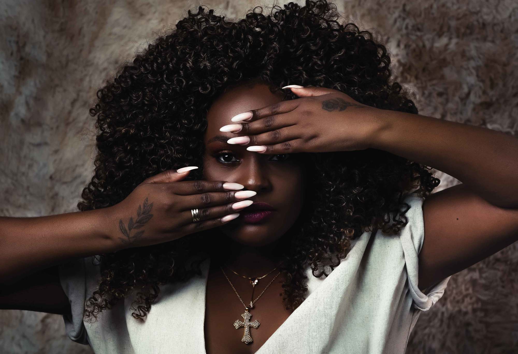 loving your natural hair: woman with dark skin and afro hair