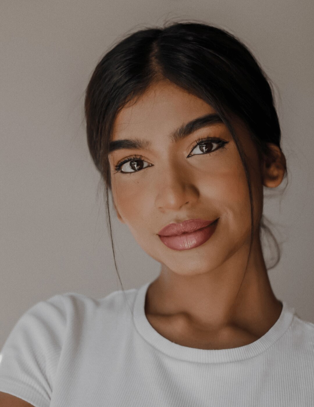 woman with low bun hairstyle