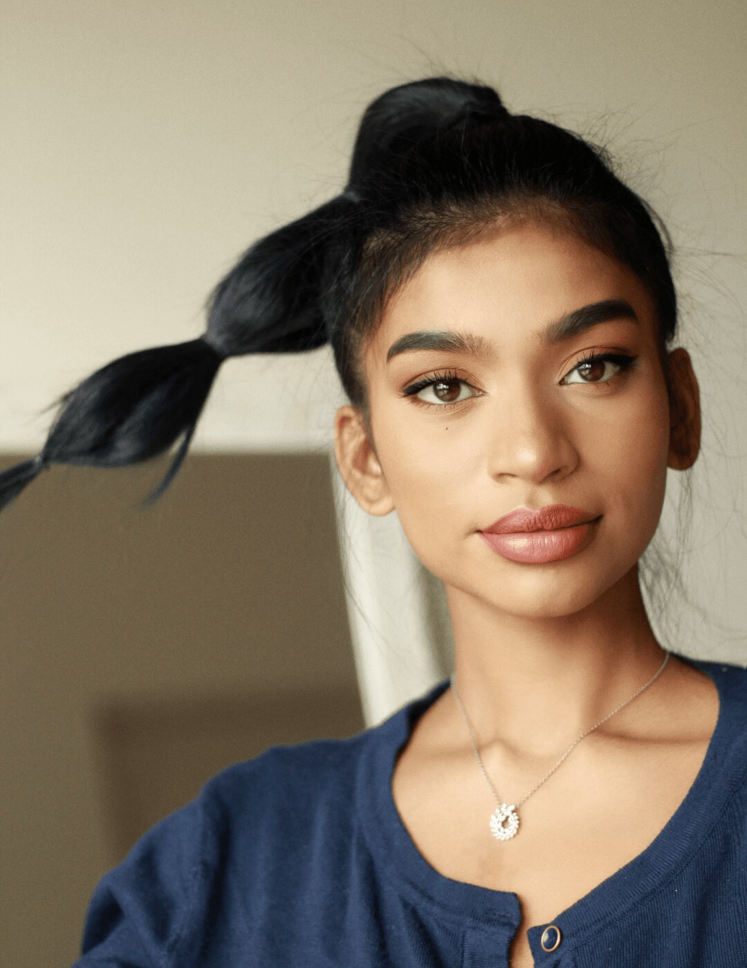 woman with a bubble ponytail hairstyle