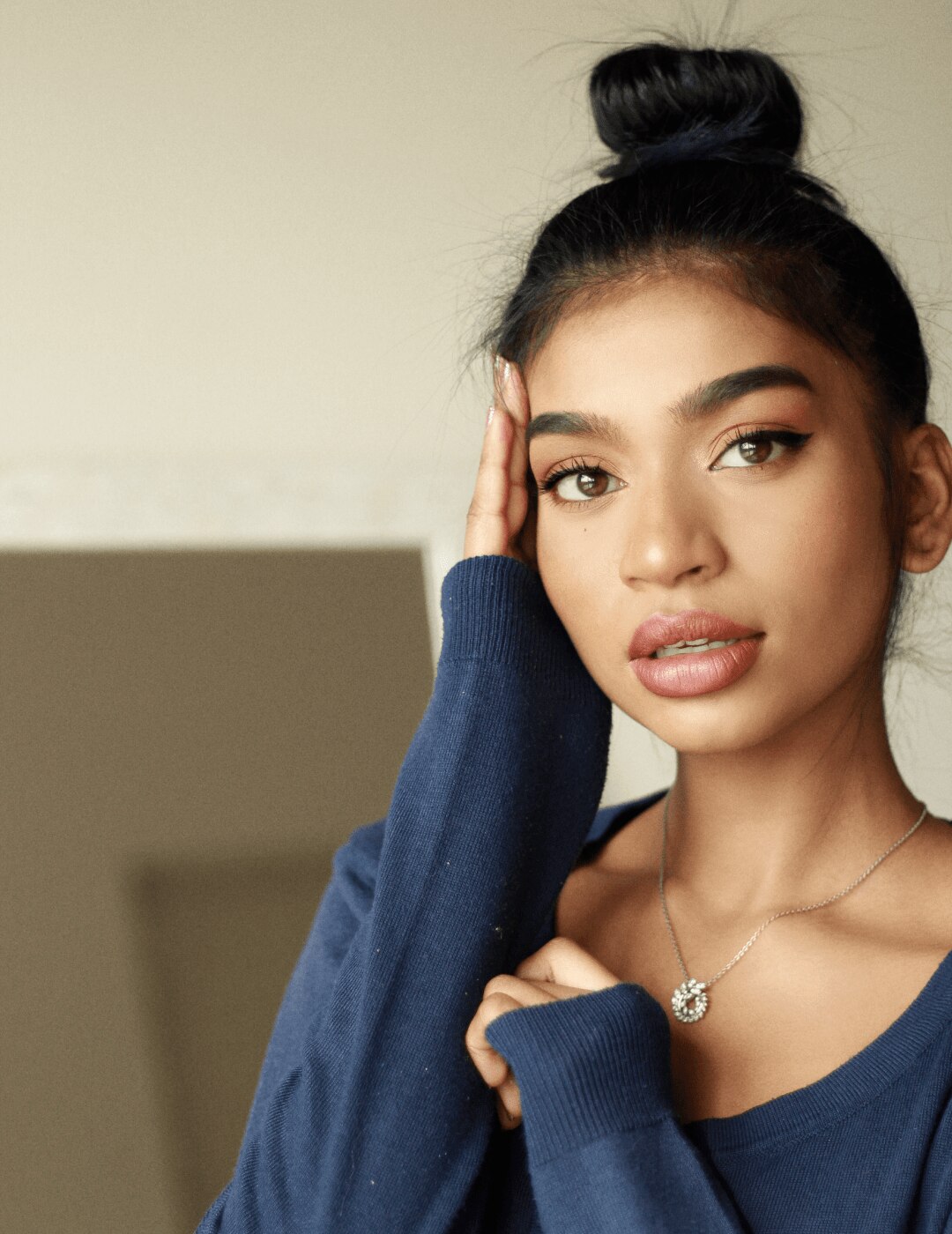 high bun topknot hairstyle