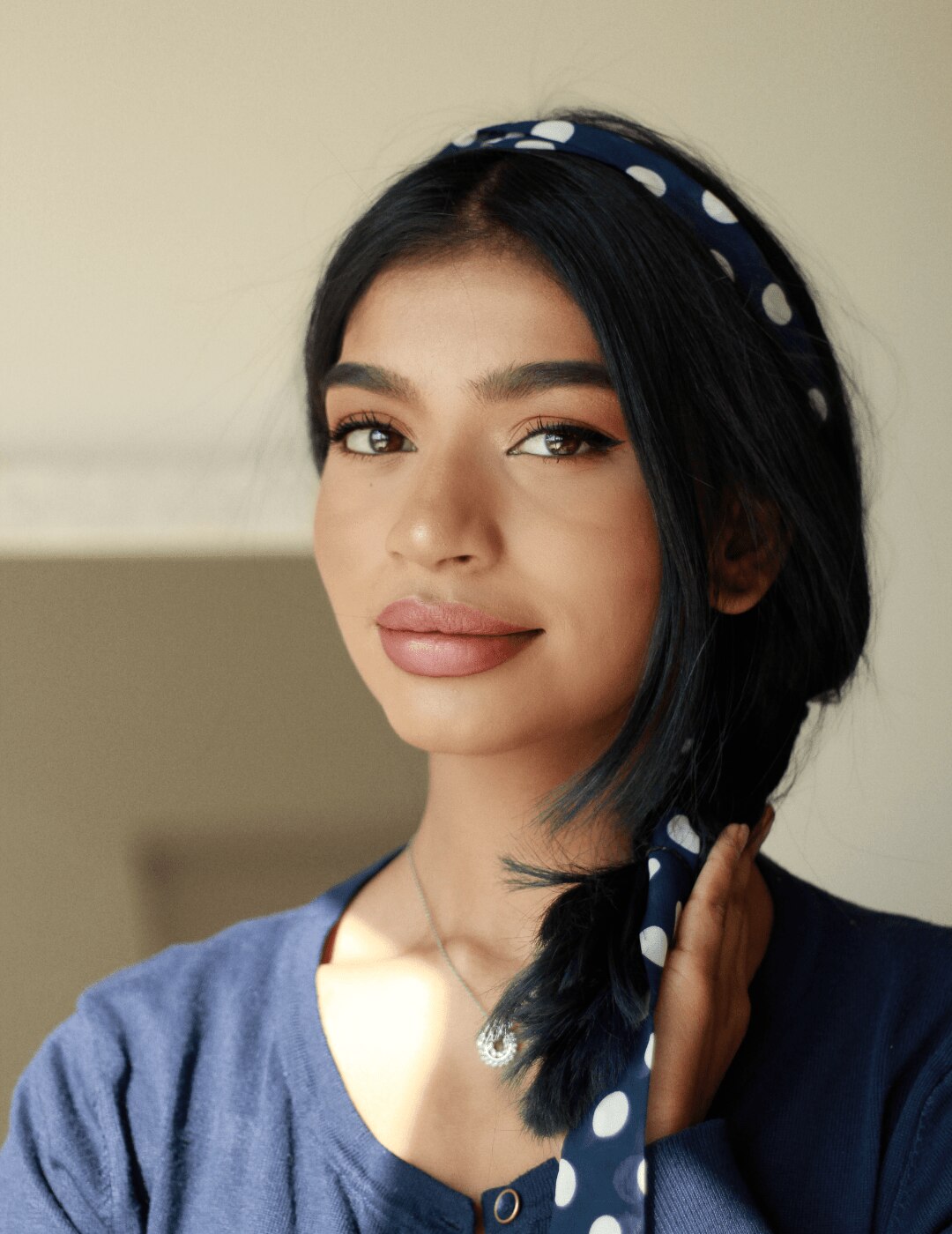 woman with scarf braid hairstyle