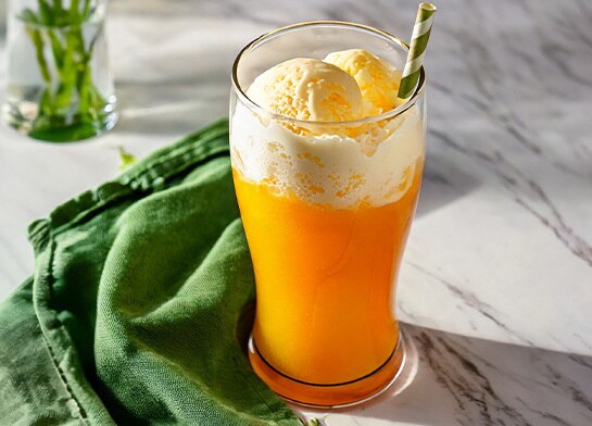 Ice Cream float with Popsicle orange and Vanilla ice cream.
