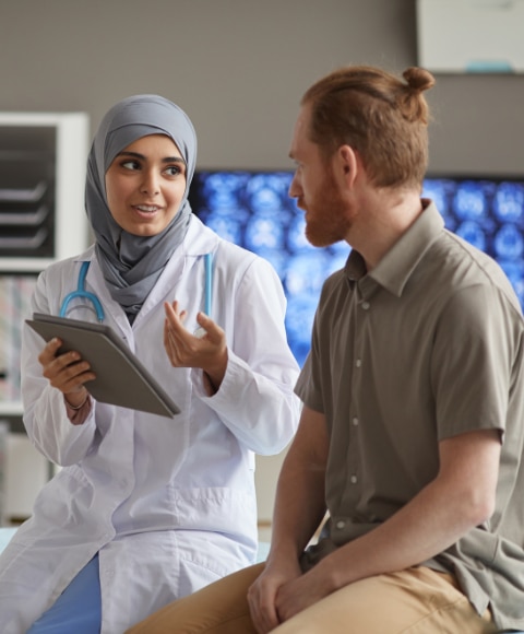 Doctor patient conversation about excessive sweating treatments and solutions