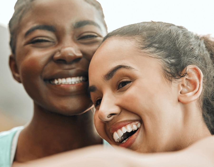 Two happy women feeling confident about their deodorant ingredients