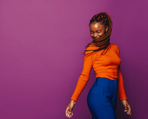 Happy vibrant young black woman free from odor on her clothes