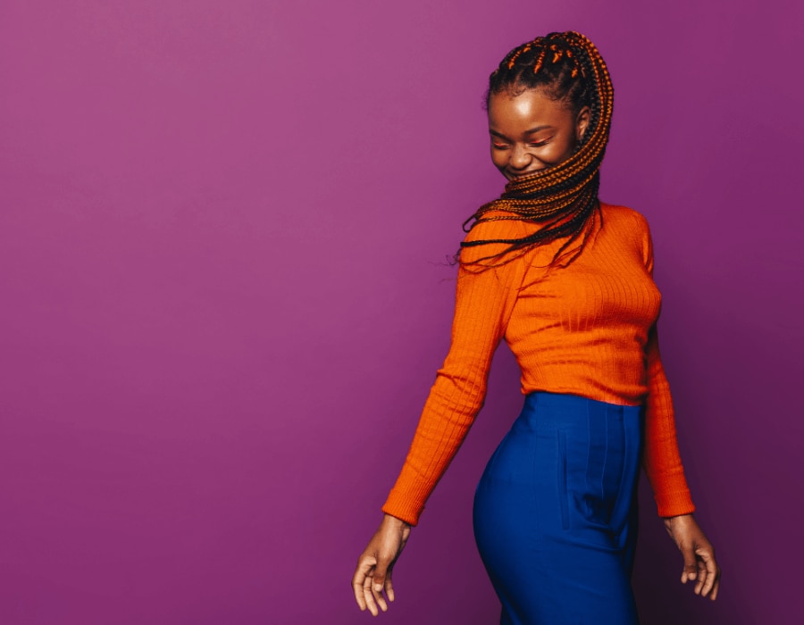 Happy vibrant young black woman free from odor on her clothes