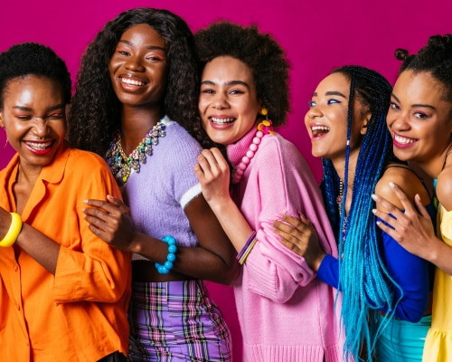 Group of happy women with melanin-rich skin tones