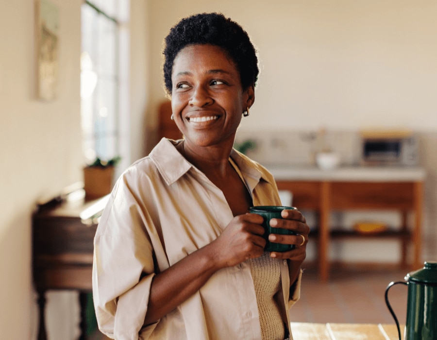 Woman enjoying a coffee at home