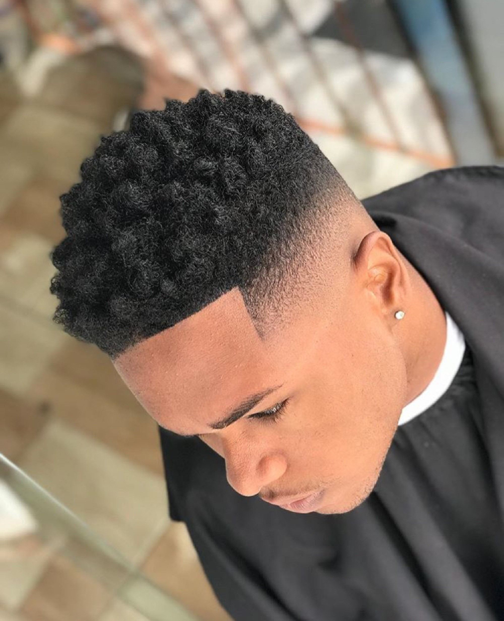 Cortes e estilos da moda para cabelo afro masculino