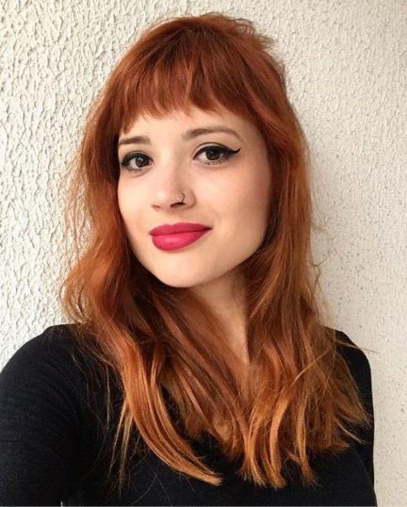 modelo de Desafios do cabelo ruivo