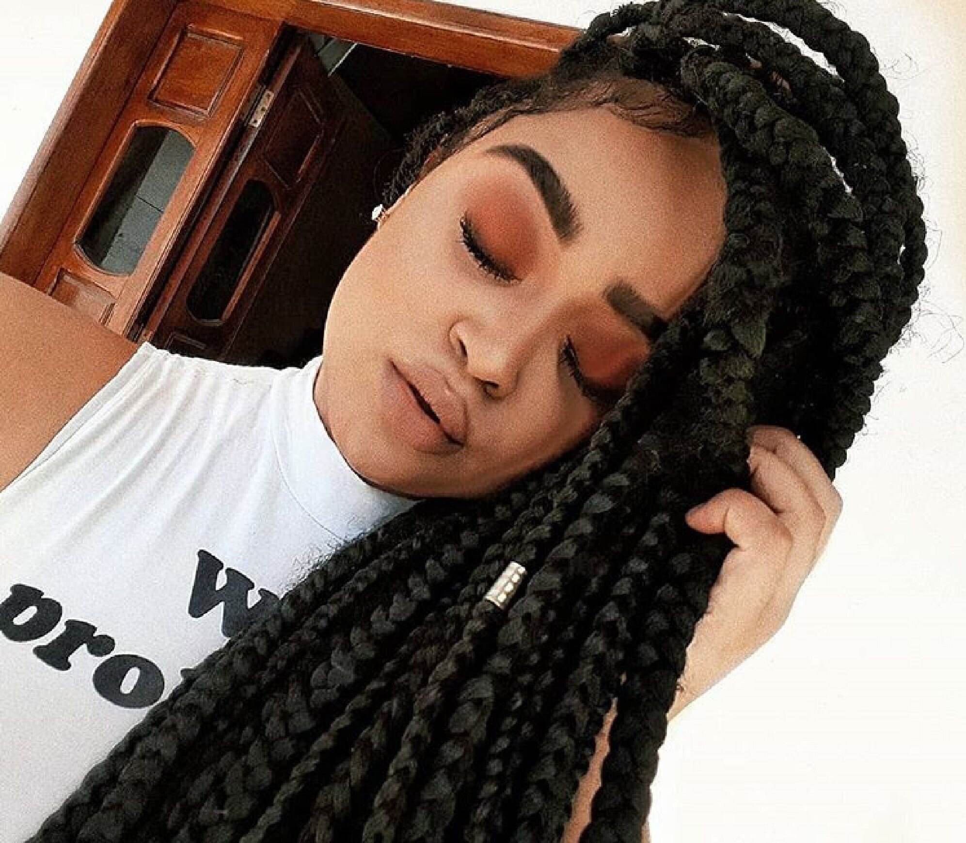 Box braids com aneis nas tranças