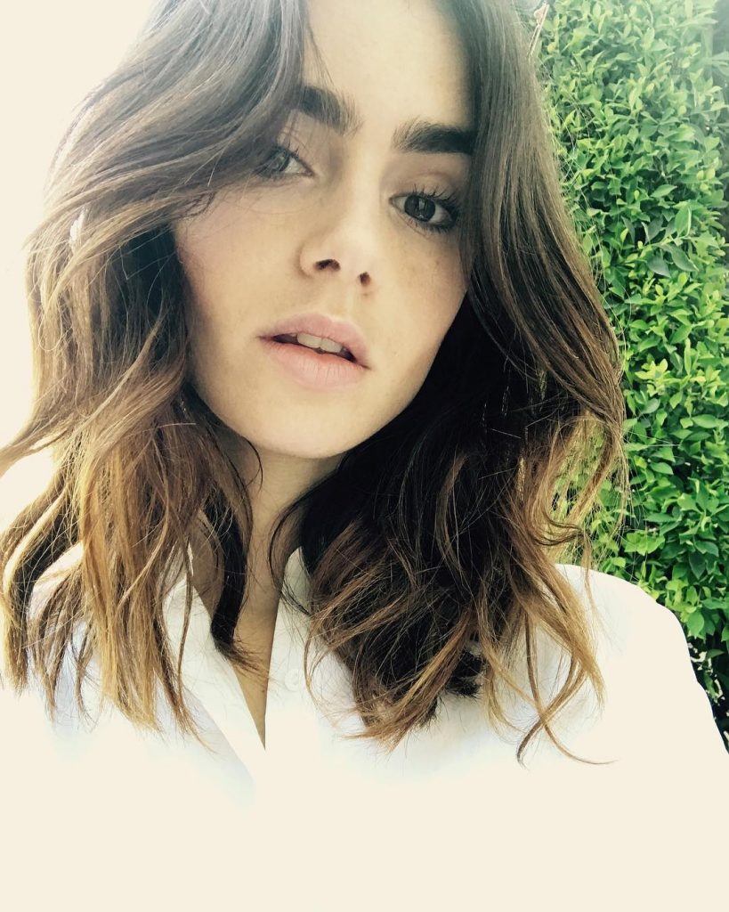 cabelo lily collins long bob