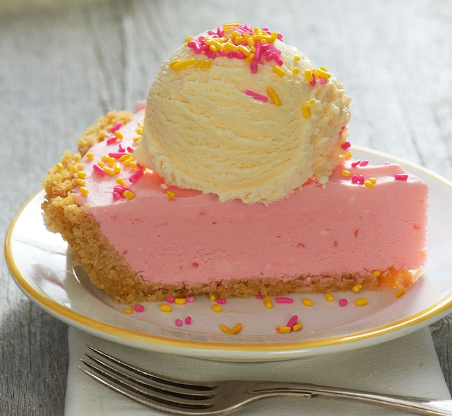 Slice of Pink Lemonade Vanilla pie on dessert plate.