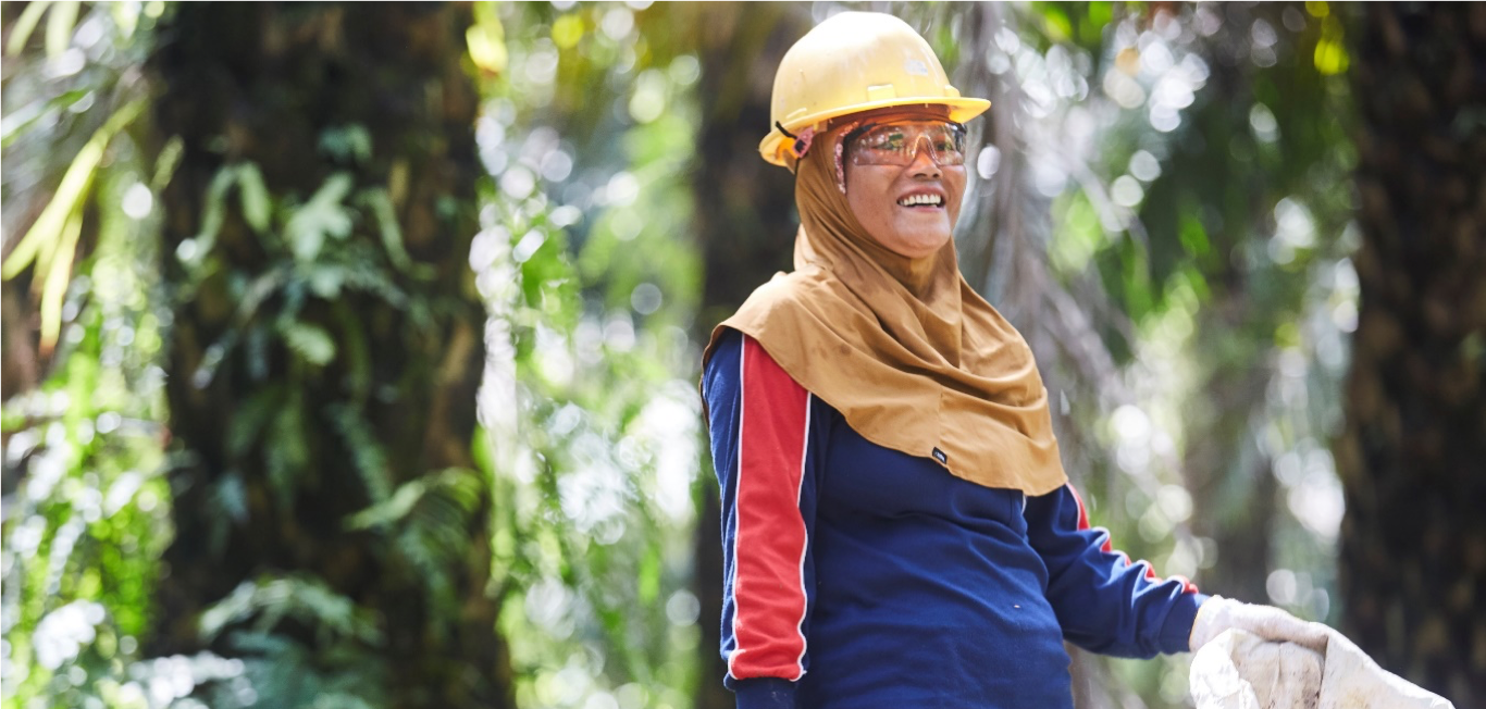 Local woman working with local bamboo materials to make something