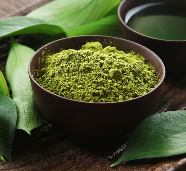Matcha powder in a bowl.