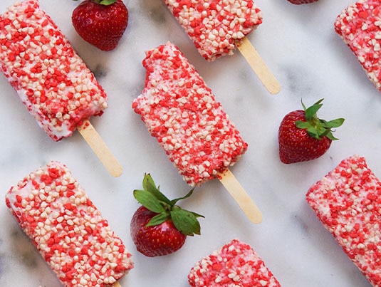 Strawberry Shortcake dessert bars on white background.