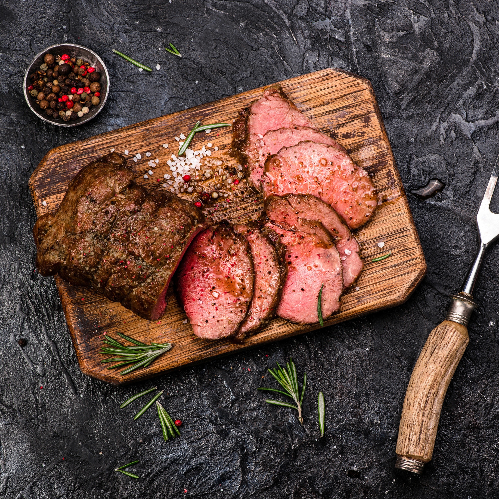 Roast beef on a chopping board