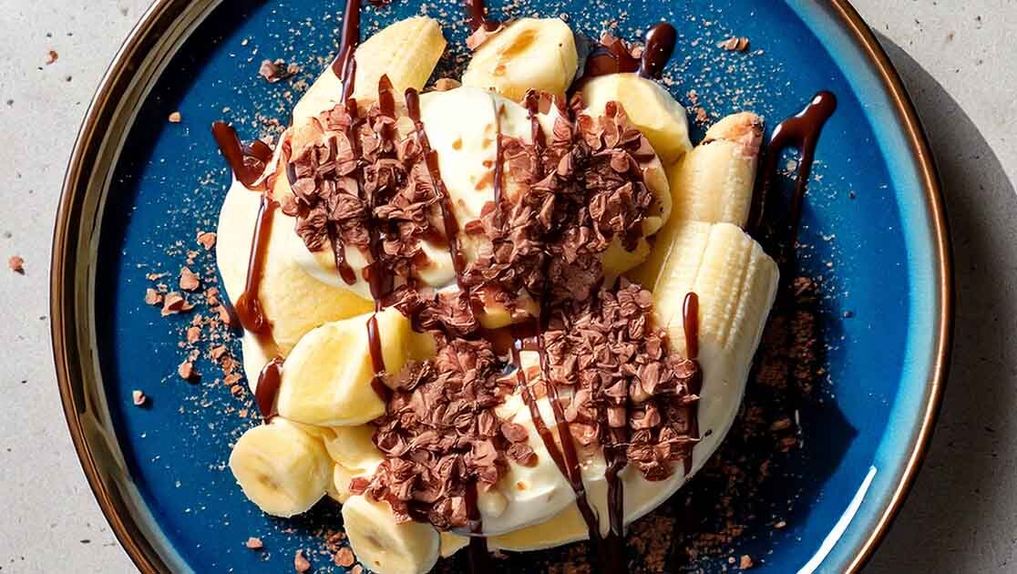 Close-up shot of banana split with Klondike Cookies & Creme bar chunks