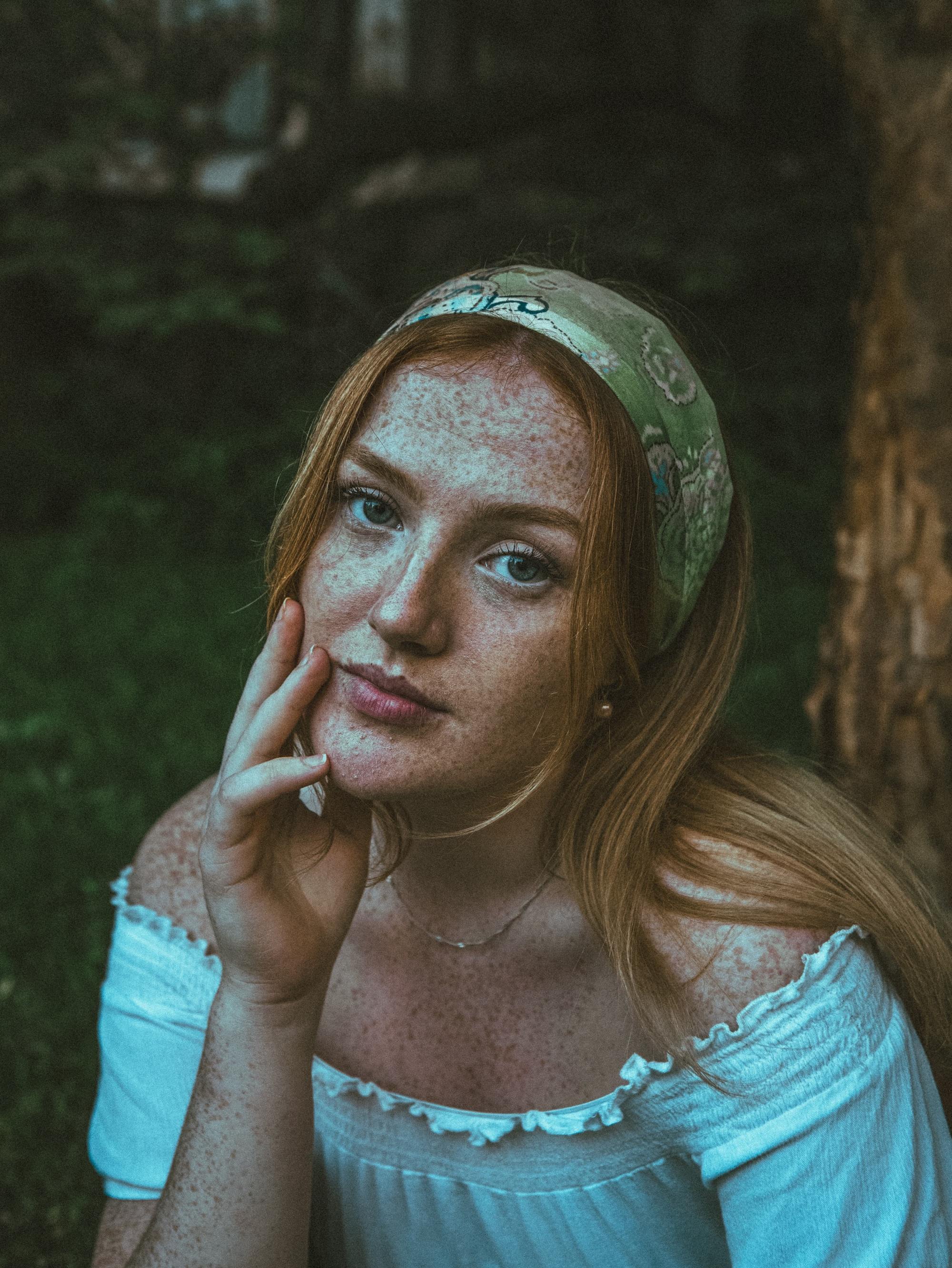 Woman wearing a patterned headscarf
