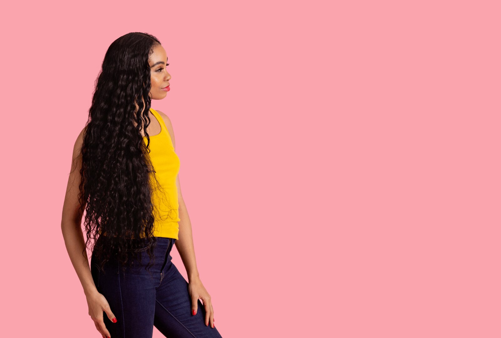 Woman with hip-length wavy hair