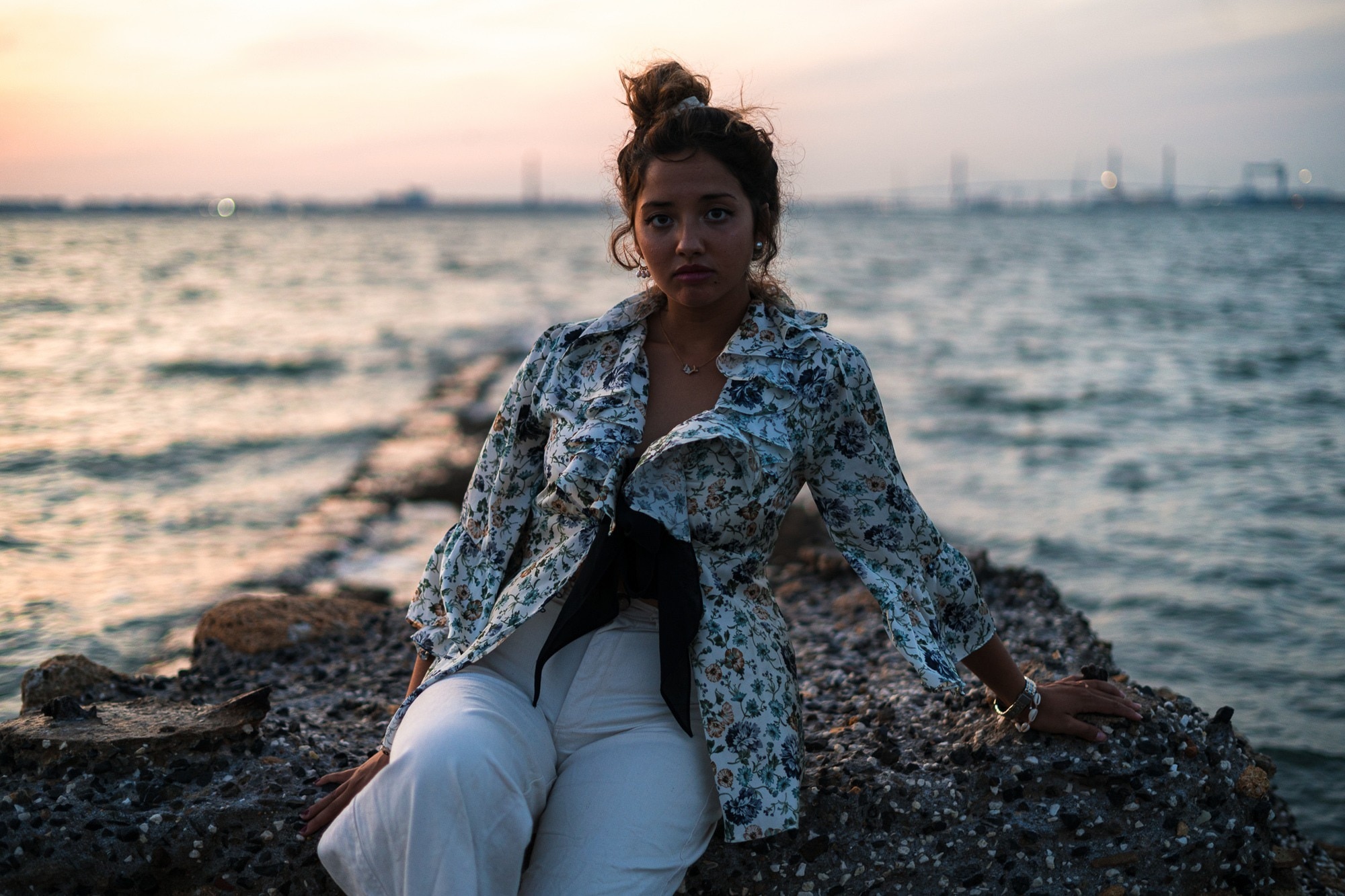 woman with a messy bun hairstyle