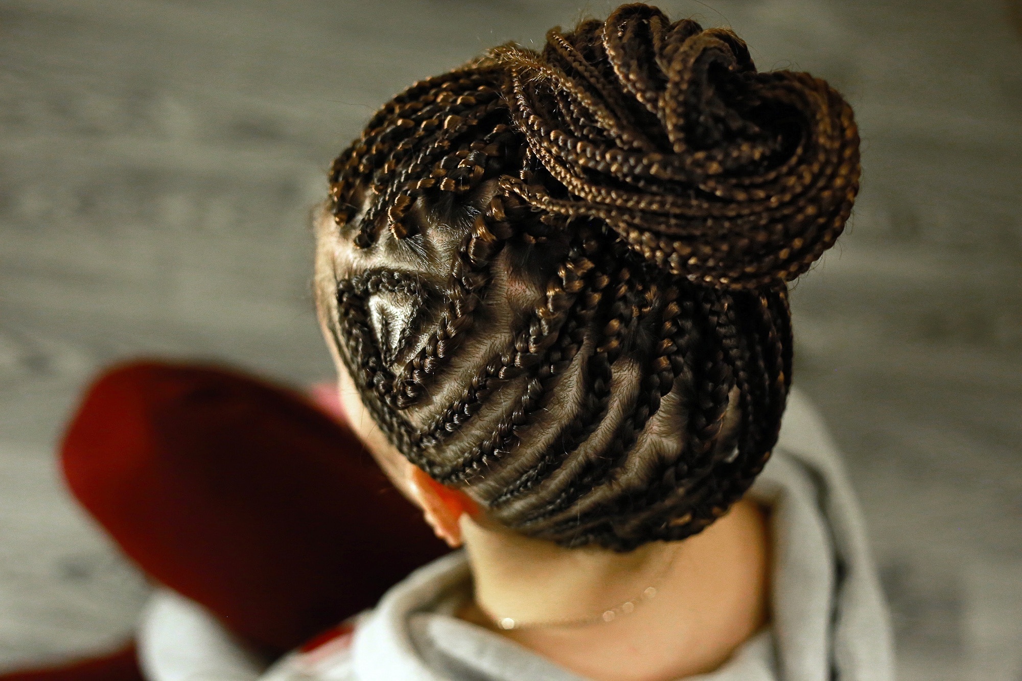 cornrows high bun brown and blonde highlights