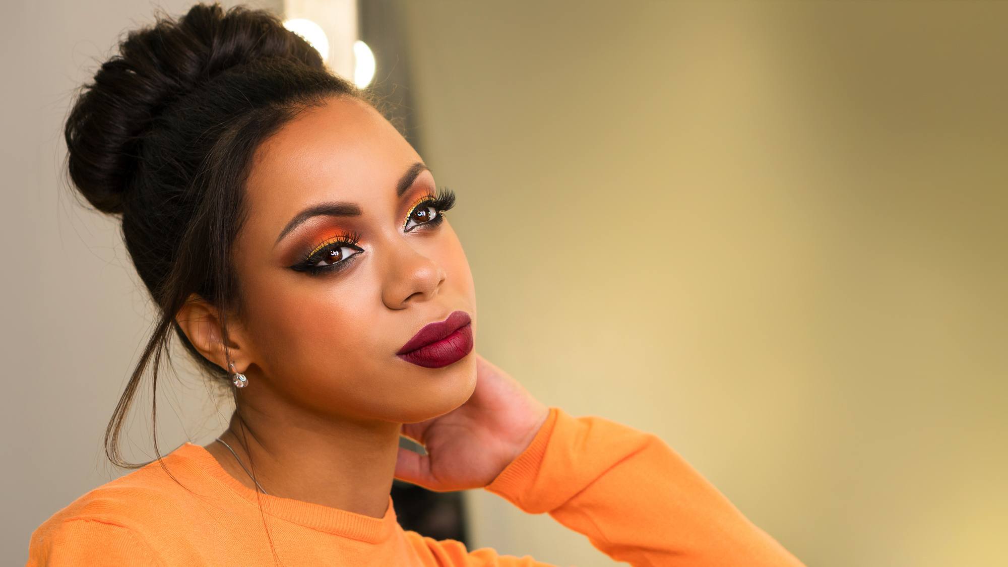woman with high bun club hairstyles