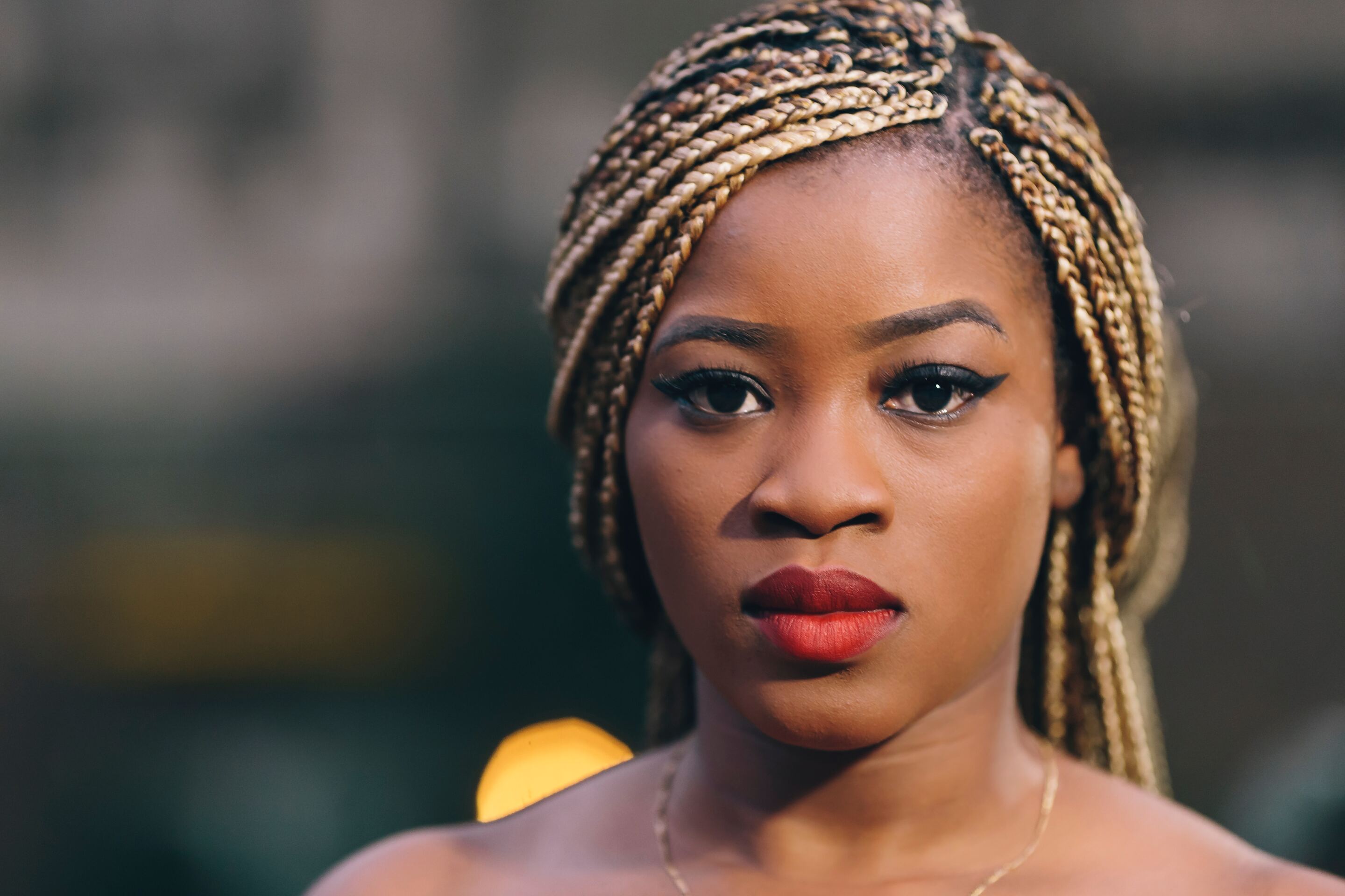 black girl blonde and black braids box braids mini braids