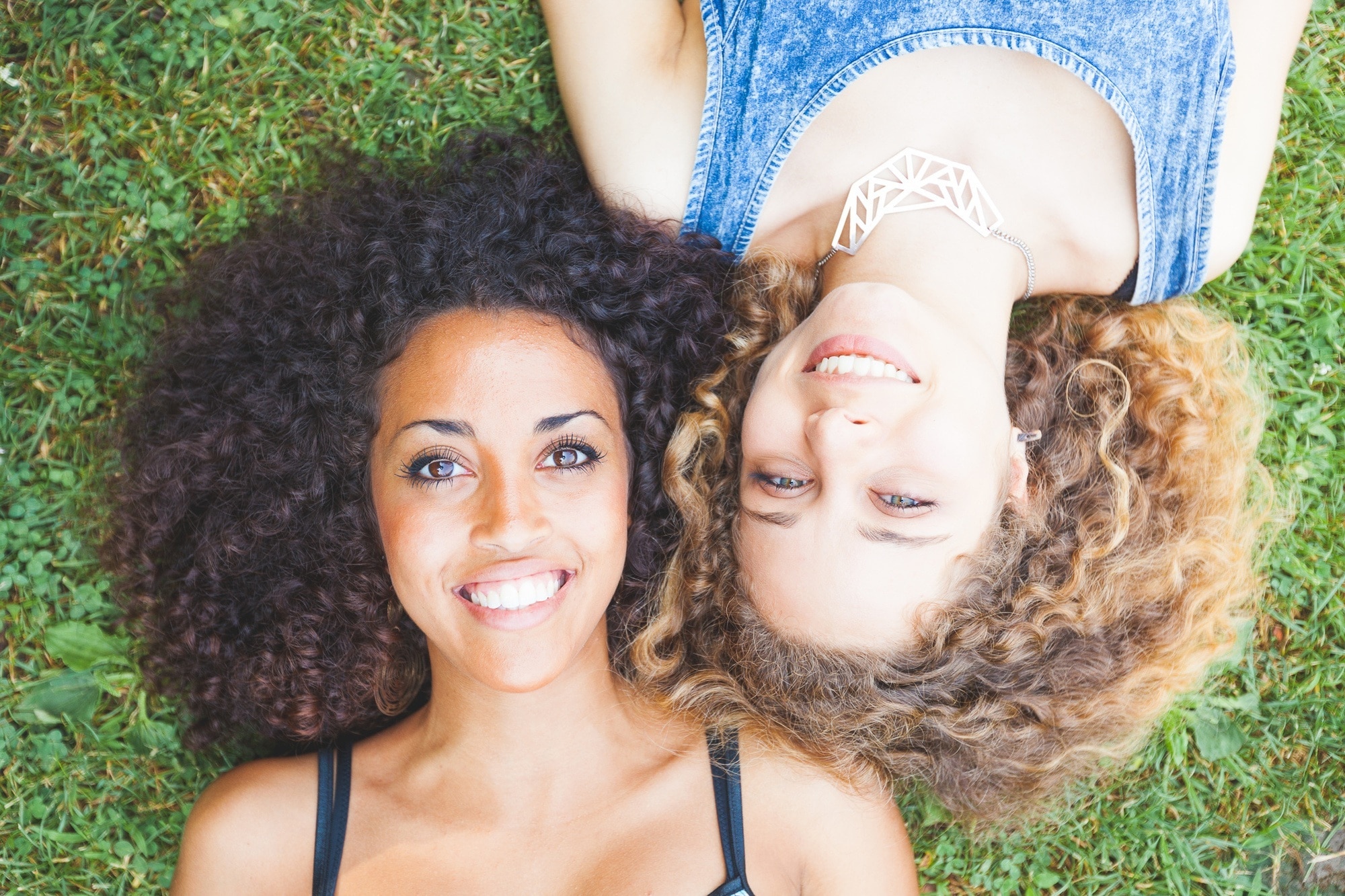 two women curly hair natural hair perm