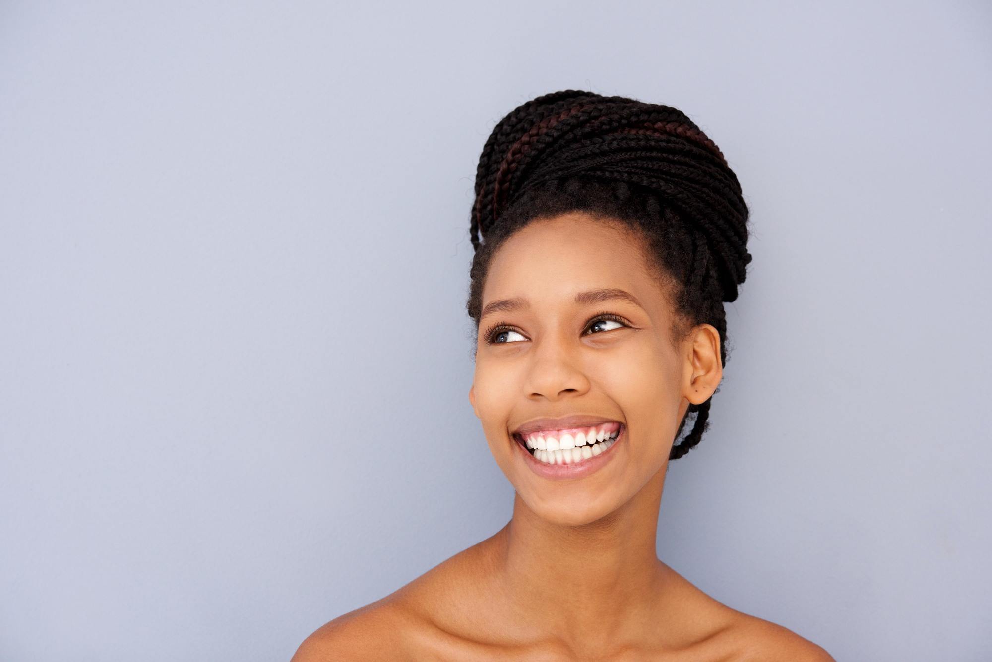 Woman with a braided bun gym hairstyle