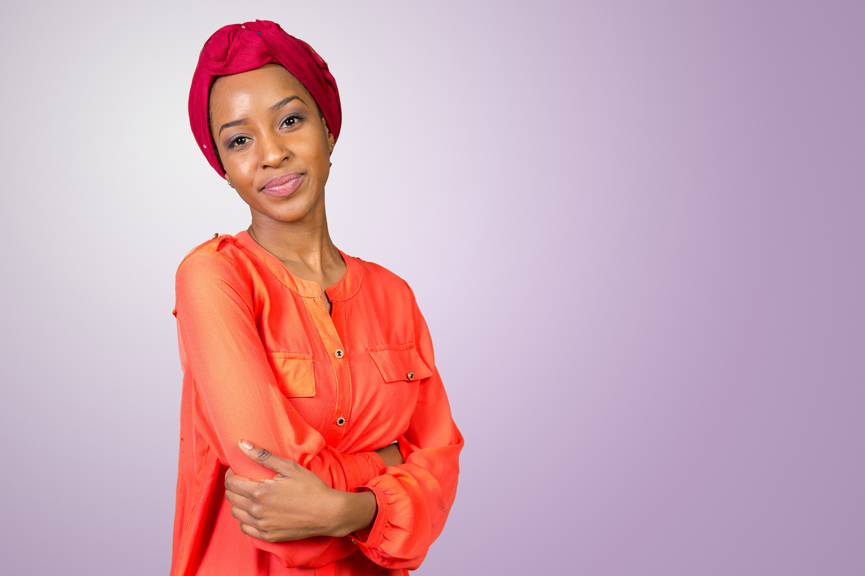woman with bright red headwrap