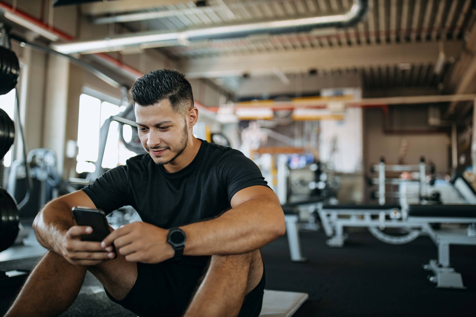 Man with textured spike hairstyle at the gym