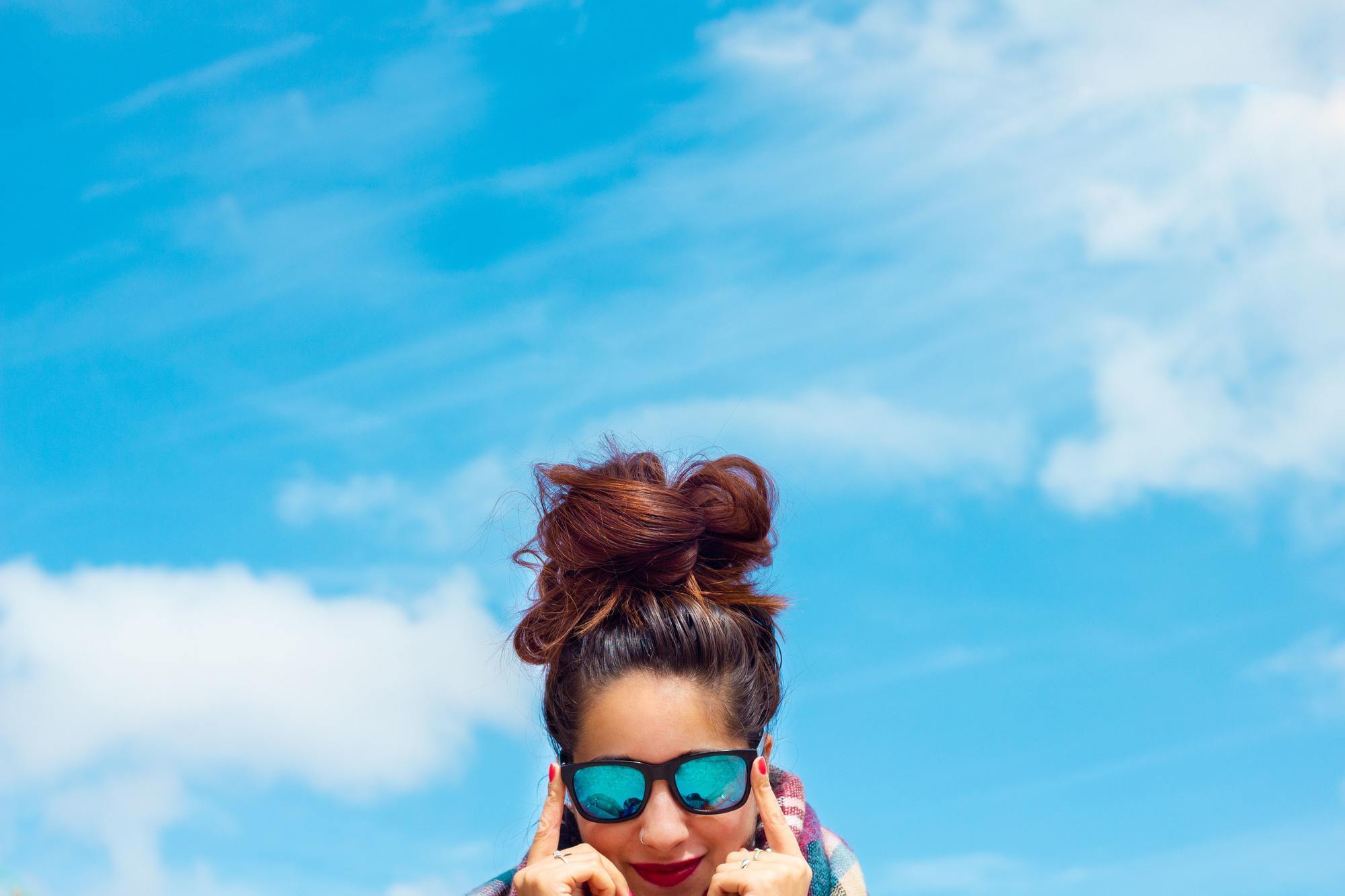 Woman wearing a messy bun