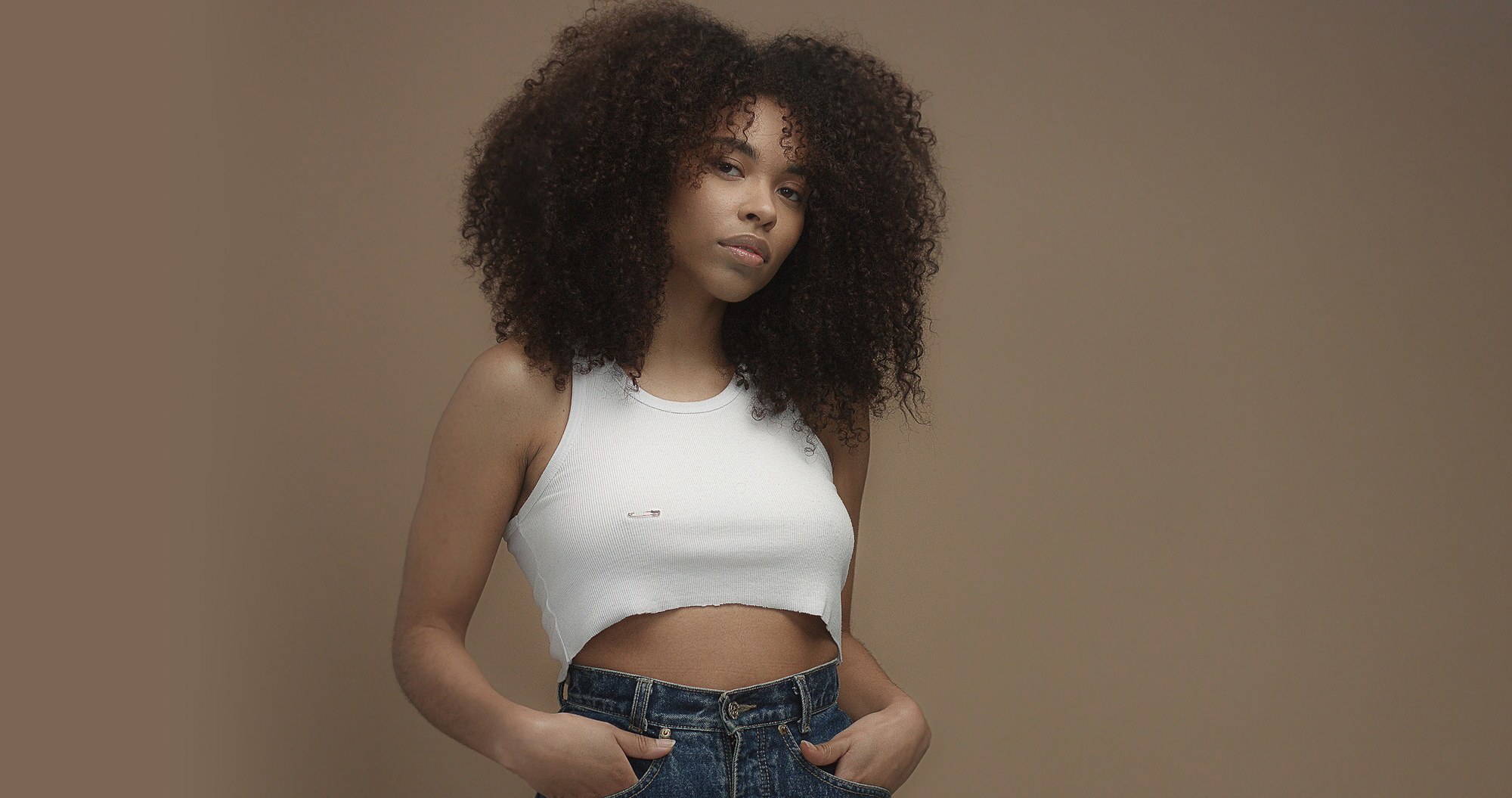 woman with big naturally curly hair
