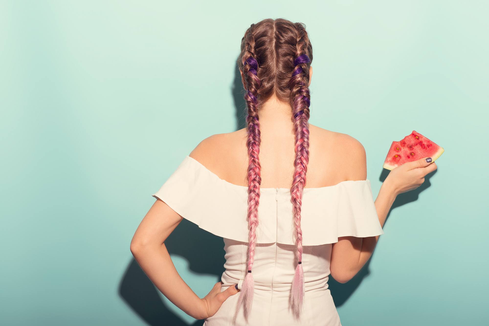 woman with pink ombre double dutch braids