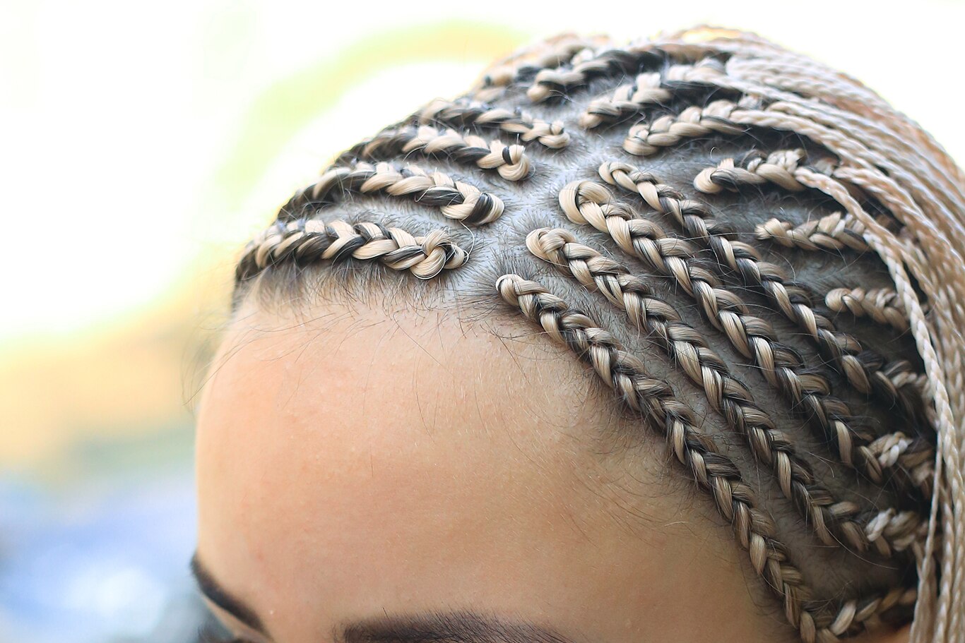 woman with Blonde Cornrow Braids