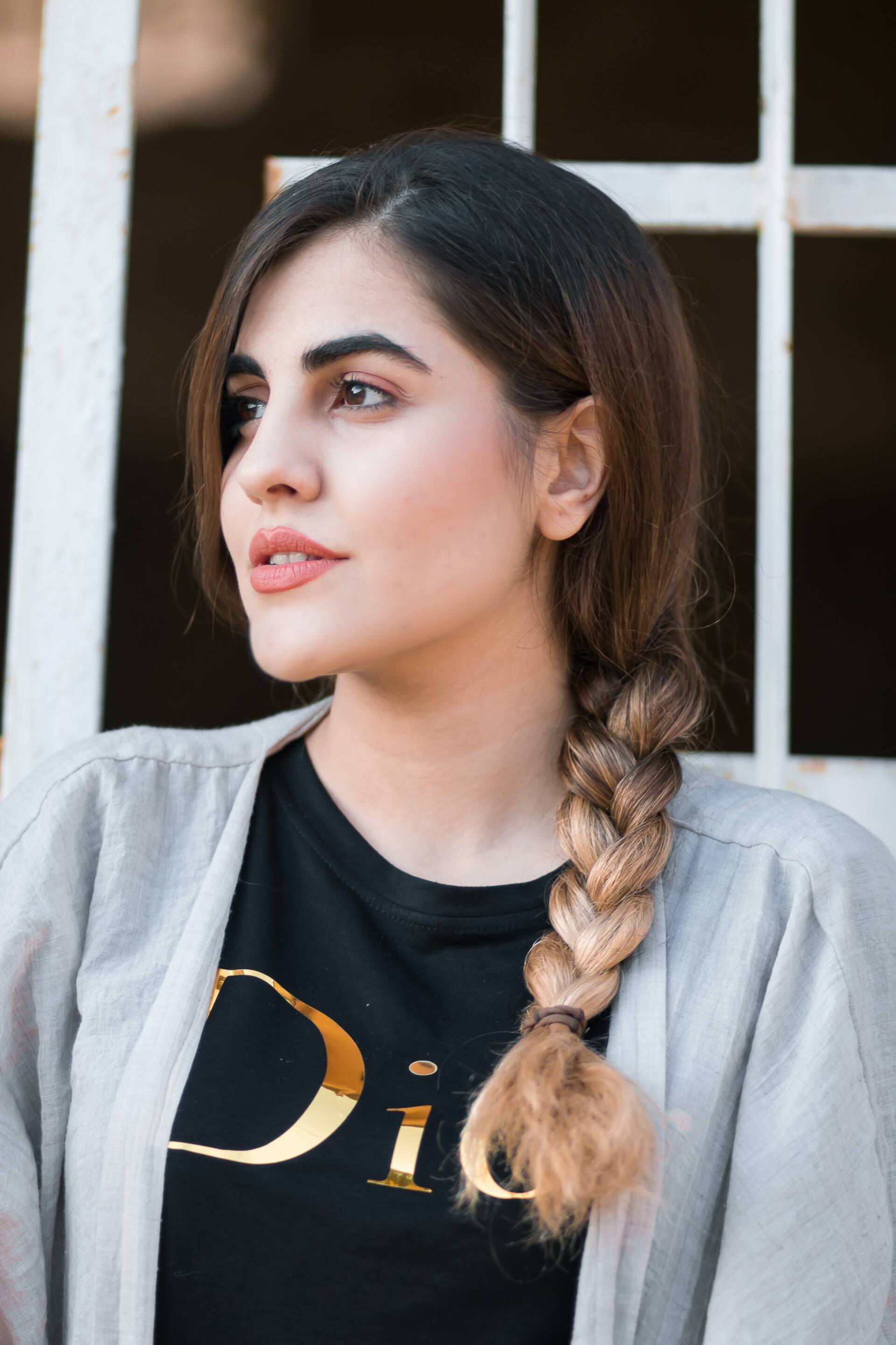 woman with an ombre, textured side braid